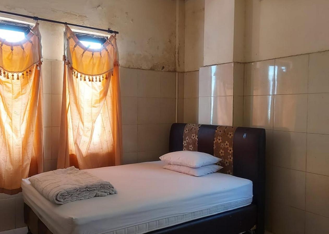 Hotel Mulia Kendari Mitra Reddoorz Pipulu Екстериор снимка